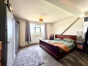 Bedroom One- click for photo gallery